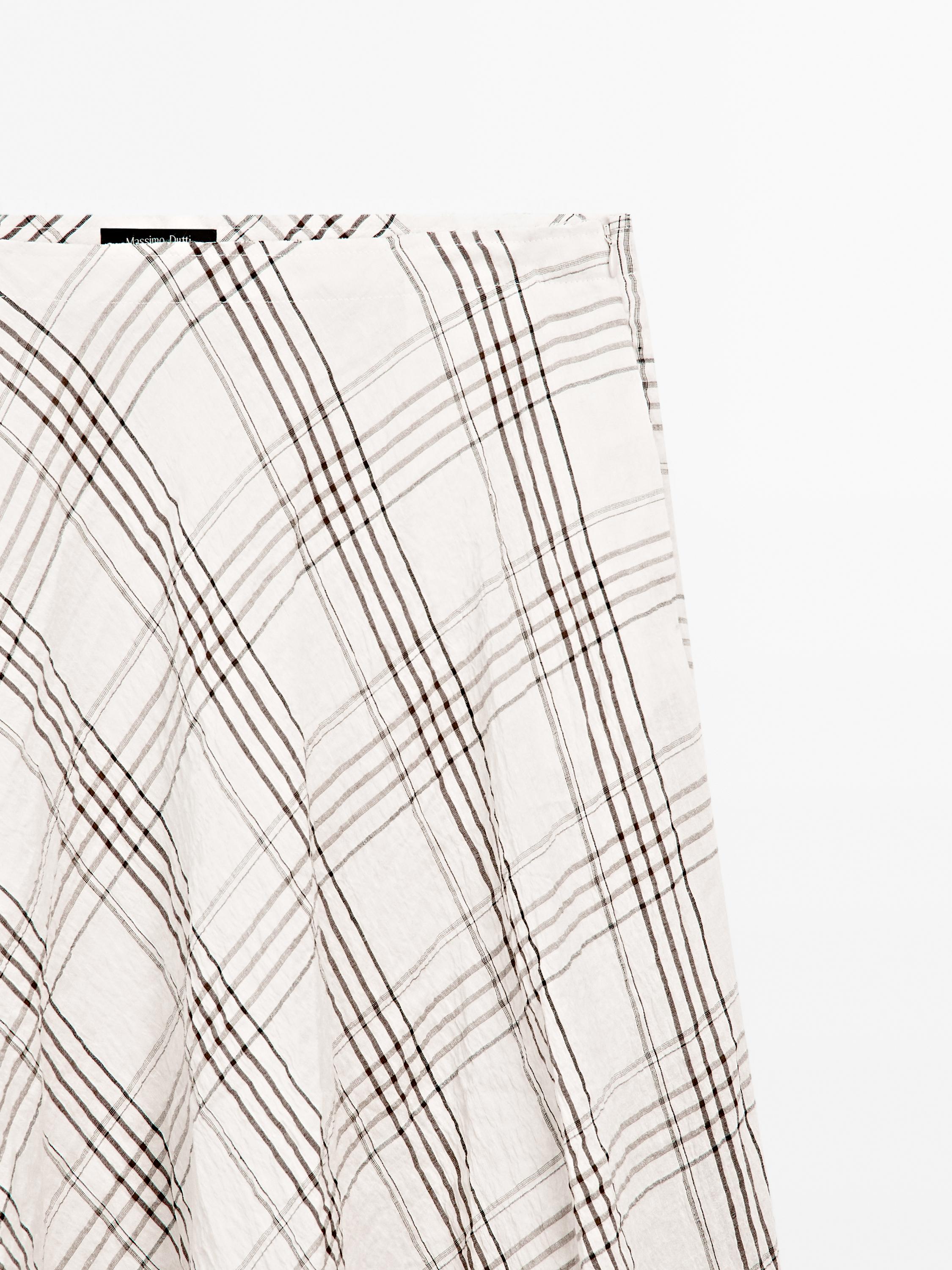 Jupe midi fluide à carreaux